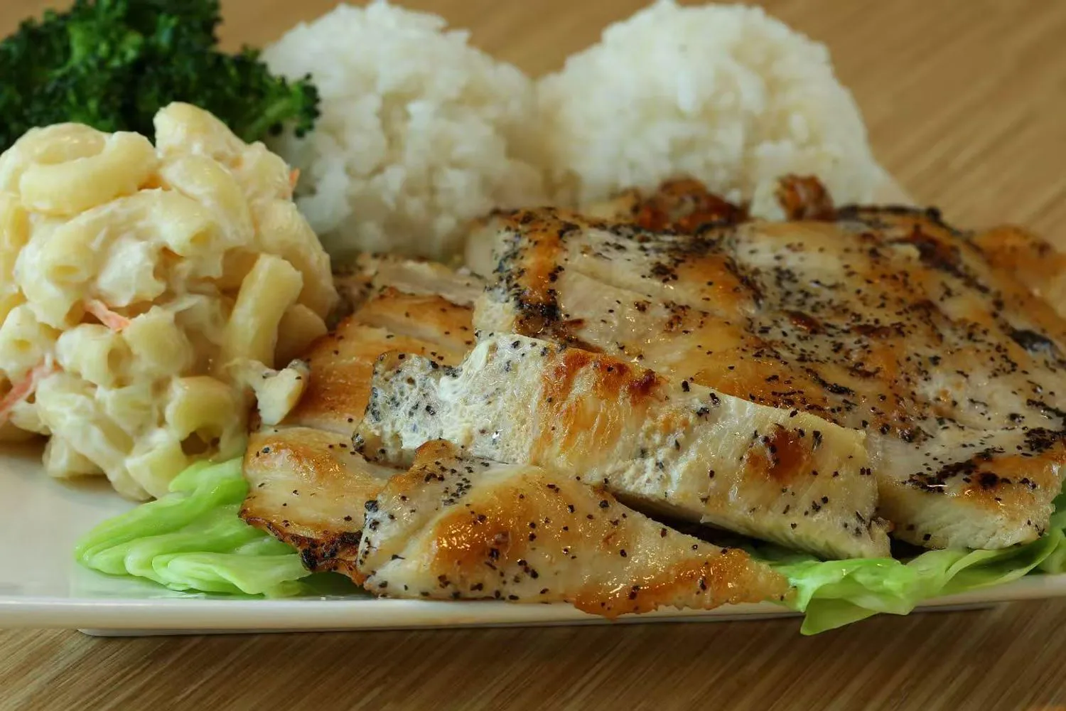 Seasoned grilled chicken with sides at Islands Hawaiian BBQ Restaurant in Gilbert